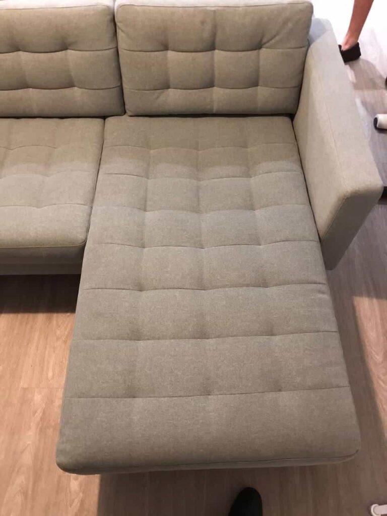 This is an after photo of a grey sofa that has been steam cleaned works carried out by Belsize Park Carpet Cleaning Solutions