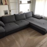 This is a photo of a grey L shape sofa that has been professionally steam cleaned, also the beige carpets have been steam cleaned too works carried out by Belsize Park Carpet Cleaning Solutions